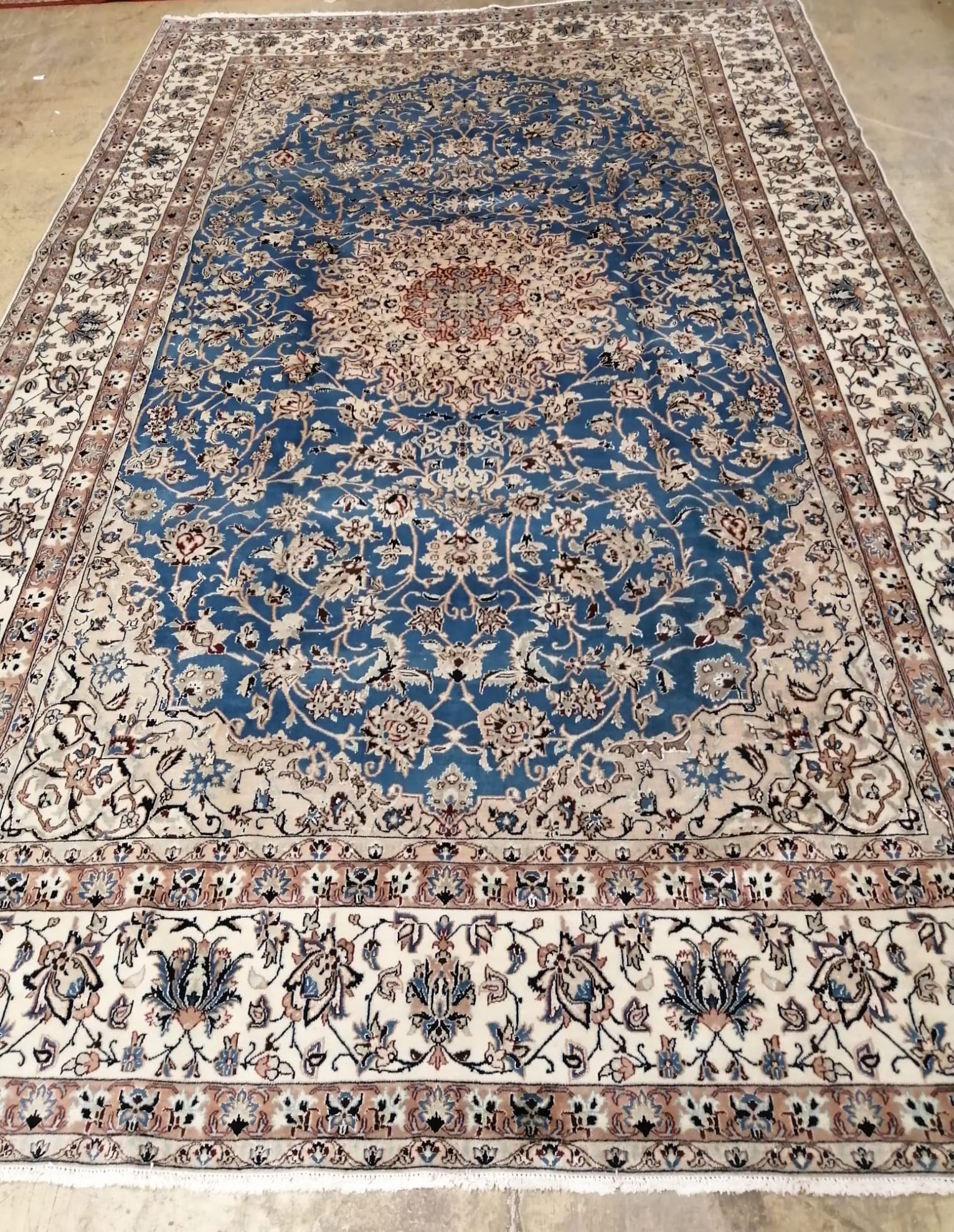 A Nain blue ground carpet, 355 x 215cm